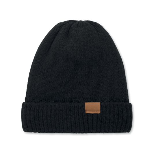 Bonnet doublé polaire personnalisé PUNTOS noir en maille côtelée, revers orné d'un patch en suédine marron