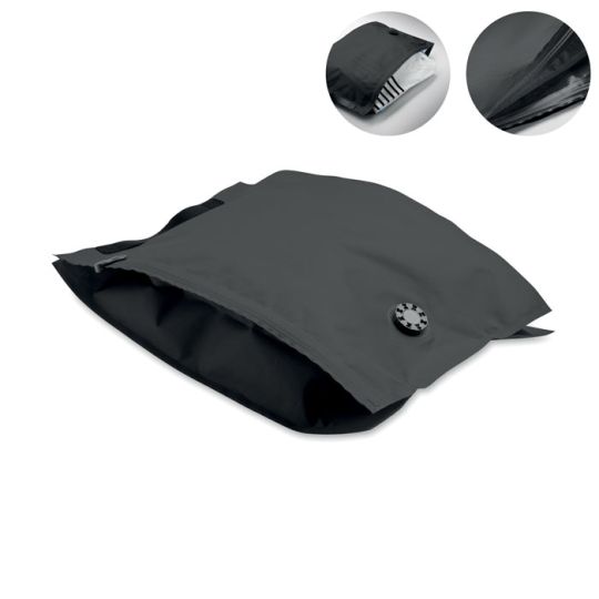 Sac de compression personnalisé noir FLOW en polyester avec valve ronde, vue du rangement de vêtements et du zip