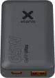 Chargeur de voyage publicitaire Xtorm 65 W GaN gris anthracite avec ports USB-C et USB-A à liseré orange