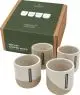 Lot de 4 tasses à café en céramique recyclée ReClay blanc crème et base sable devant leur coffret vert