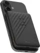 Batterie externe magnétique Xtorm Go2 noire fixée au dos d’un smartphone, nervures et logo X en relief