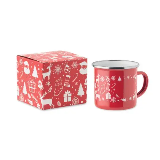 Mug de Noël publicitaire rouge en métal émaillé à motifs blancs et liseré argenté posé à côté de sa boîte cadeau