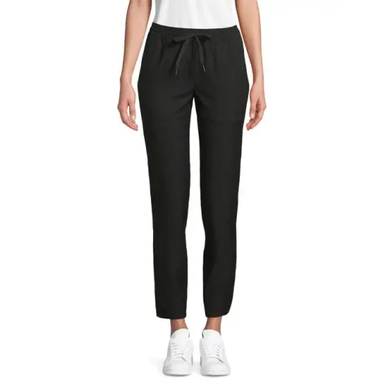 Pantalon tailleur femme personnalisé noir GERMAIN WOMEN porté de face, ceinture élastiquée à cordon et bas resserré