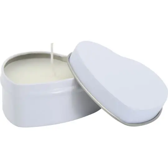 Bougie parfumée vanille dans boîte métallique ovale blanche ouverte montrant cire et mèche