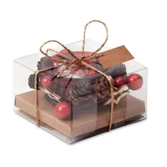 Bougie décorative personnalisable en verre rouge avec pommes de pin et boules dans boîte transparente nouée de ficelle