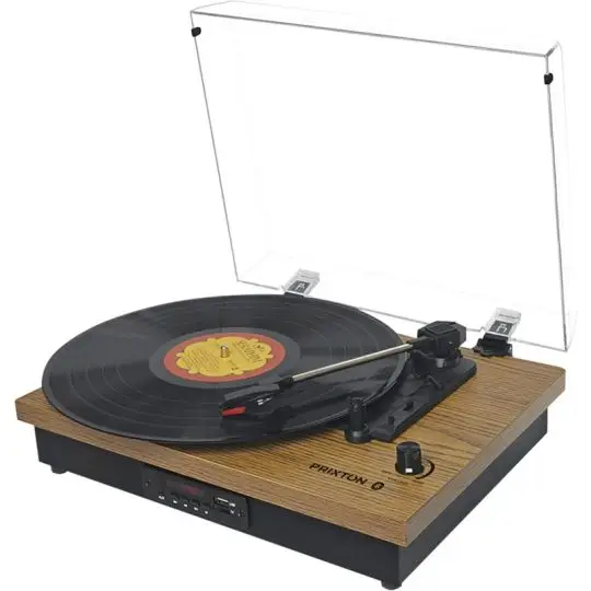 Tourne-disque Bluetooth Prixton Studio effet bois publicitaire avec capot transparent relevé et vinyle sur la platine