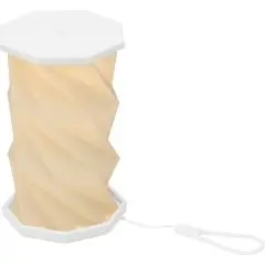 Lampe d'ambiance publicitaire Celestia allumée avec abat-jour plissé translucide et socle octogonal blanc