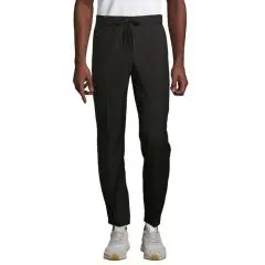 Pantalon de costume homme personnalisé noir GERMAIN MEN porté de face, taille élastiquée à cordon et bas resserré