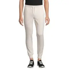 Pantalon de jogging personnalisé JUMBO écru porté de face avec cordon de serrage et bas de jambe resserrés en côte