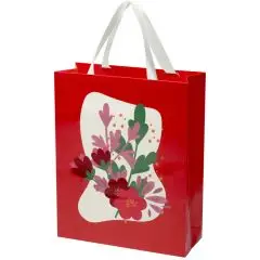 Sac en papier personnalisé rouge avec anses en ruban blanc et motif floral sur fond crème