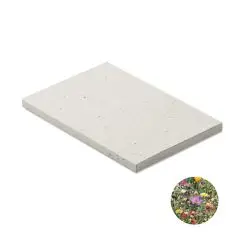 Carnet A5 personnalisé à couverture blanche en papier ensemencé moucheté, vue de biais avec détail des fleurs sauvages